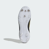 View of the outsole of the Adidas Messi F50 League FG/MG Juniors' boots, showing the versatile stud configuration for natural and artificial grass.